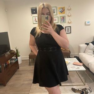 Black mini dress with lace cut out